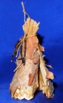 A Teepee and a Bow and Arrow